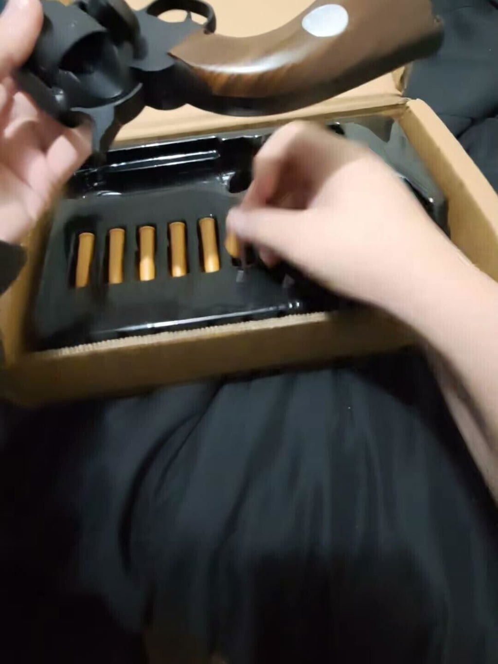 Customer opening the Outlaw 1873 gift box