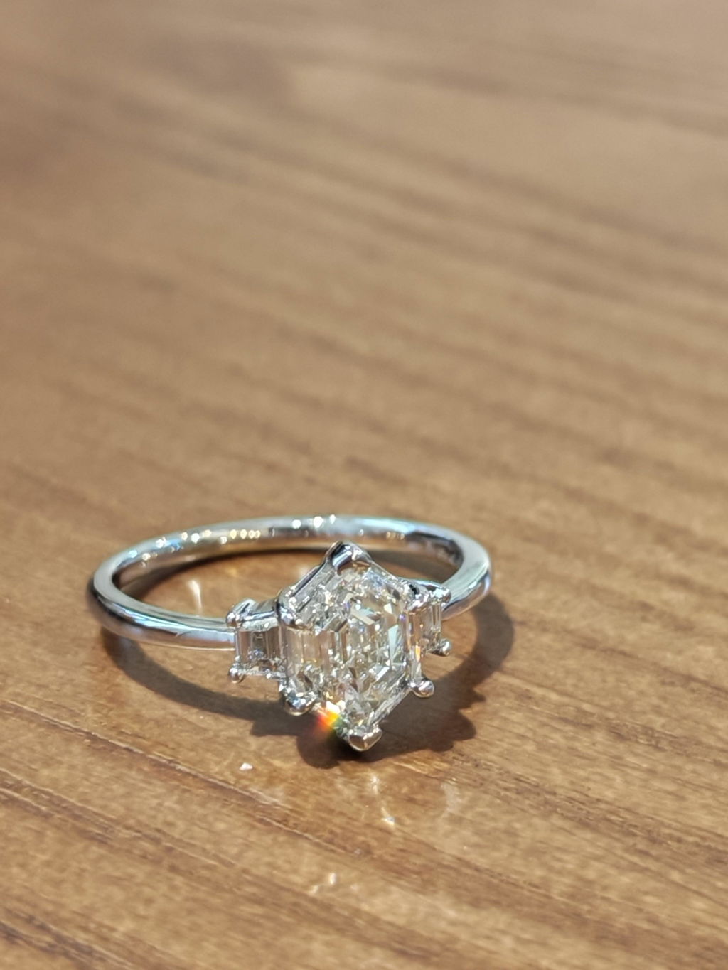 Long Hexagonal Cut Twist Band Engagement Ring