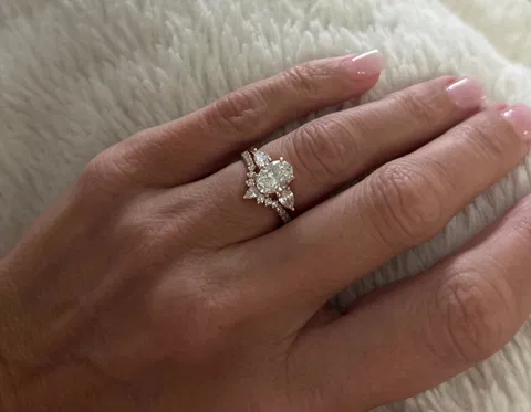 3 Stone Engagement Ring With Oval and Pear Cut Diamond