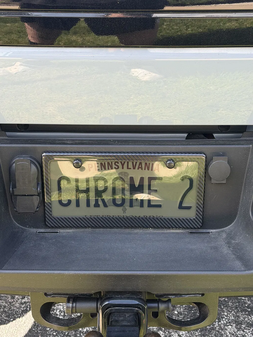 Carbon Fiber License Plate Frame - 2 Holes Wide Bottom - Gloss Finish