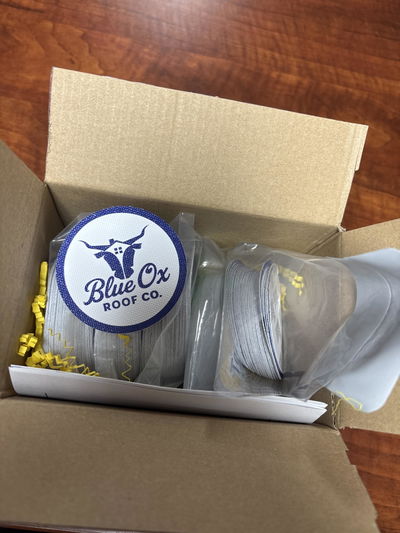 Blue Ox Roof Company's branded textured stickers, from their review photo