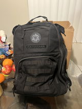 datsusara mini backpack Hemp BattlePack Black rings on sides YKK self healing zippers Removable logo with velcro patch and velcro name tape patch area Includes Nasty Bag Mini for wet/soiled gear separation Hemp Backpack | Datsusara Battlepack