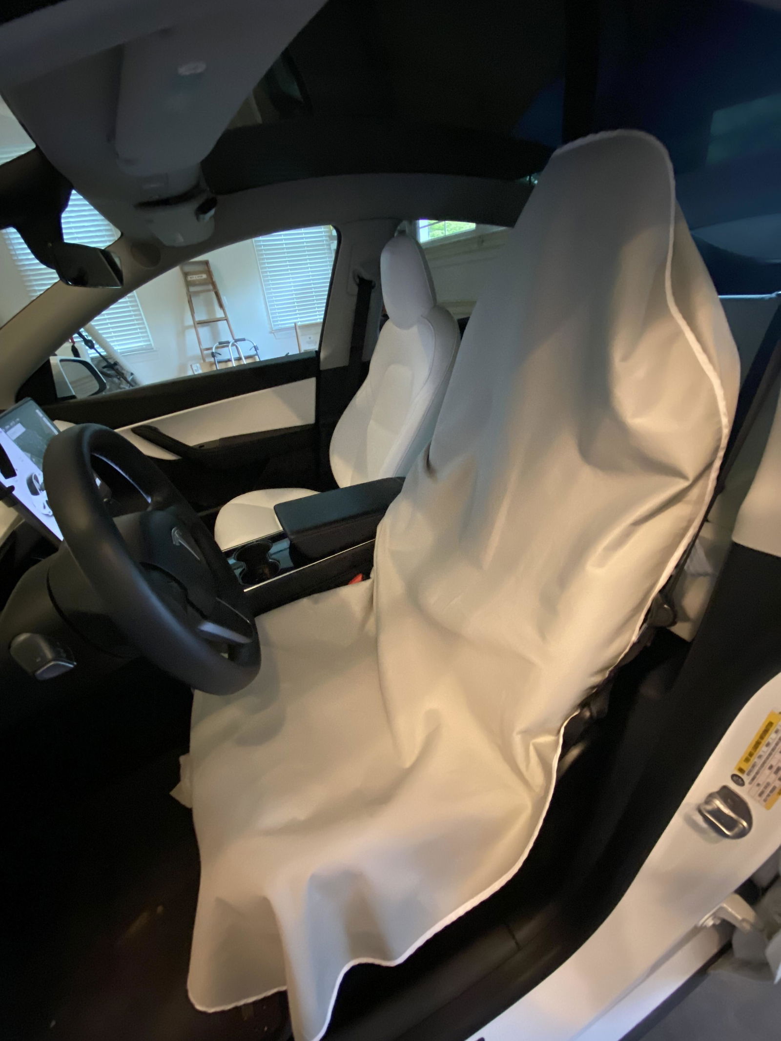 Nicky M. with her DriSeats car seat cover