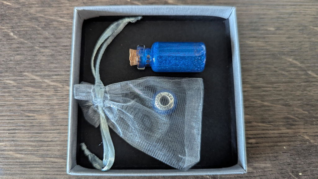Round Ashes Charm
