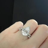 1.5 CT Pear Halo & Pave Moissanite Engagement Ring