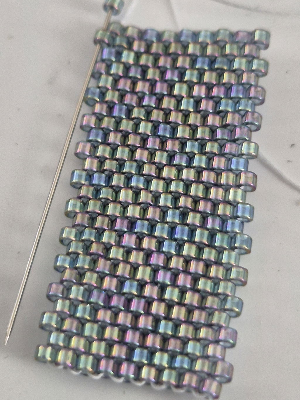 Miyuki Delica - Gold luster transparent blue grey rainbow 11/0, 5 gram