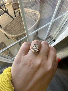 mm charles and colvard moissanite solitaire ring on finger