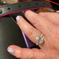 Shared Prong Pave Pear Shaped Moissanite Engagement Ring