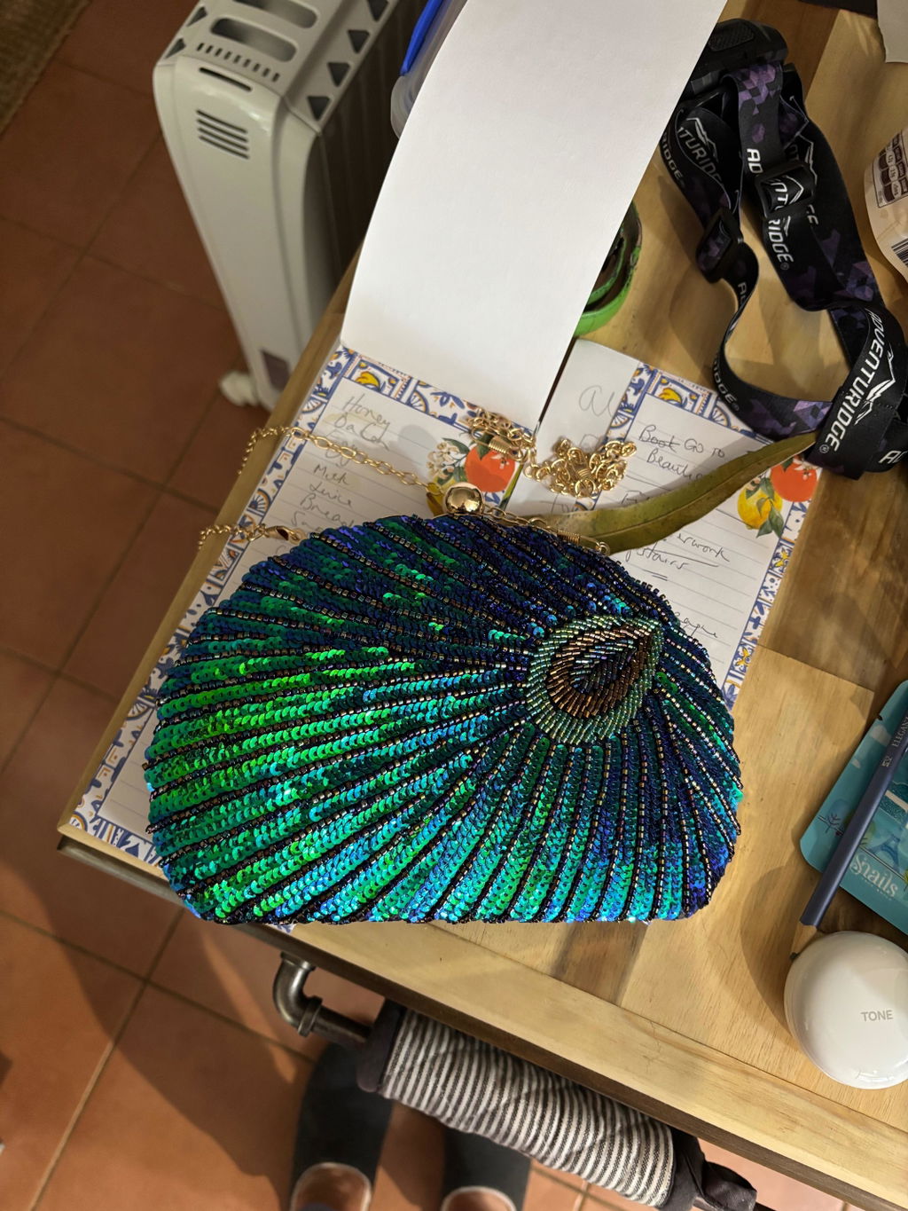 Customer styling the Peacock Clutch