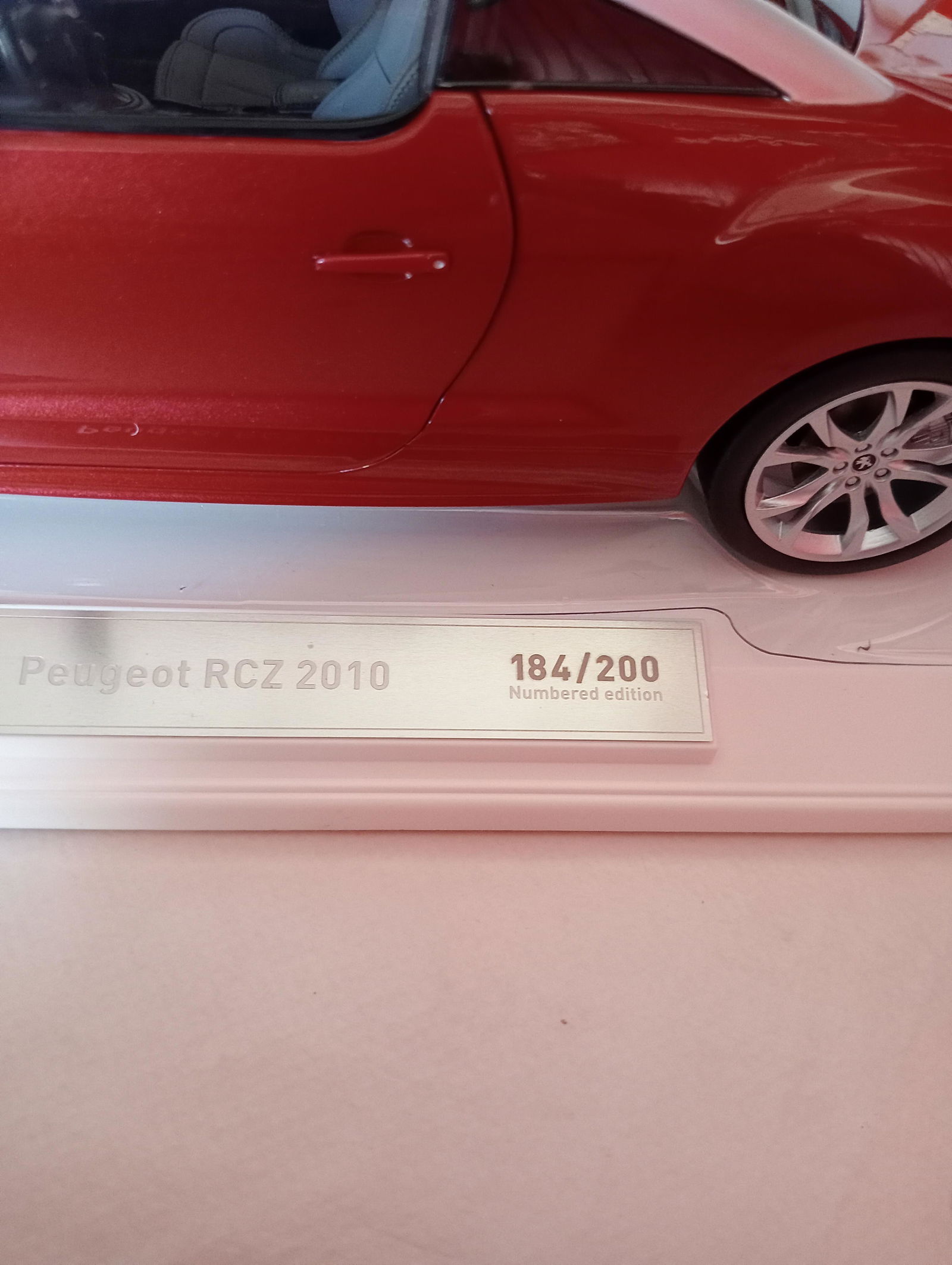Peugeot RCZ 2010 Amber Red 1:18 - 200pcs – Norev