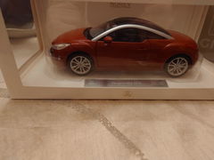 Peugeot RCZ 2010 Amber Red 1:18 - 200pcs – Norev