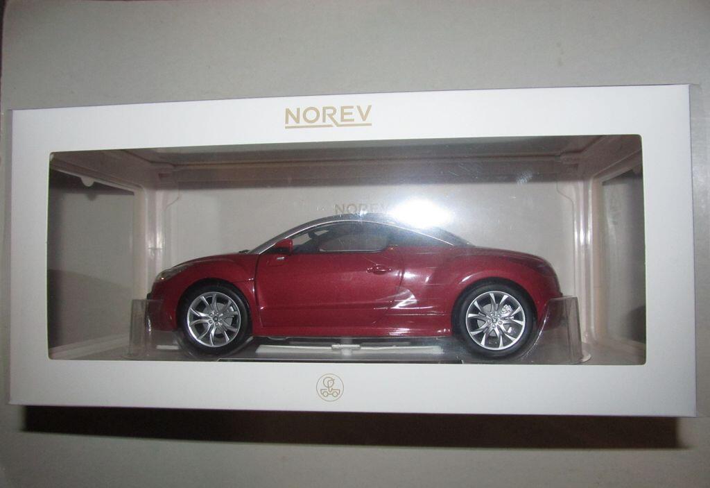 Peugeot RCZ 2010 Amber Red 1:18 - 200pcs – Norev