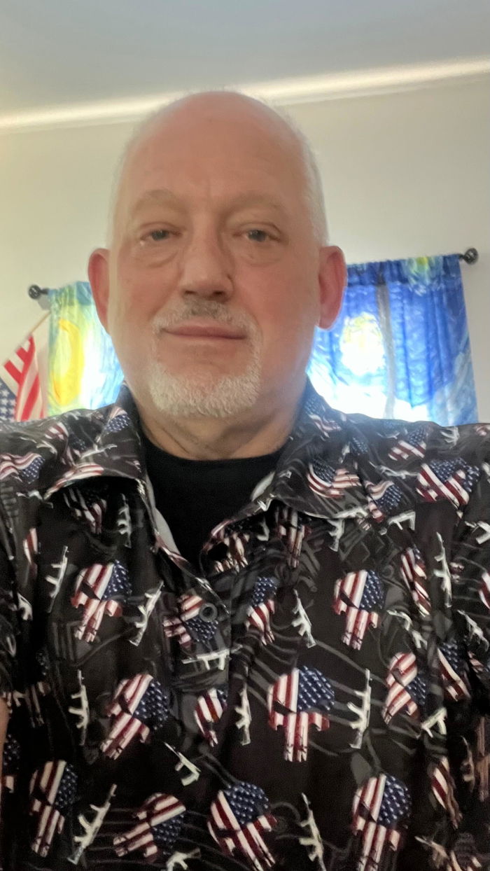 Timothy wearing The Rebellion polo