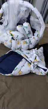 Printed Baby Round Snuggle Bed with Pillows – Teal Forest Design