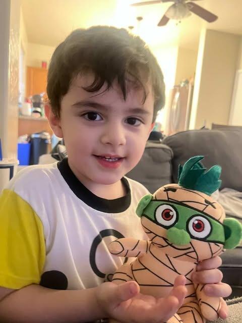 Boy with Baby Mummy plush