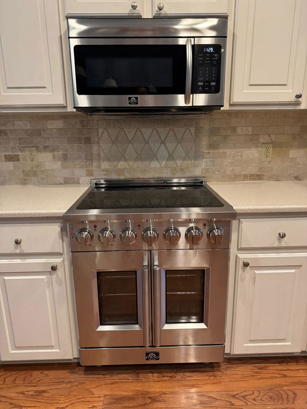 FORNO Scalo 30" 1.6 cu. ft. 300 CFM Over The Range Microwave in Stainless Steel, FOTR3007-30