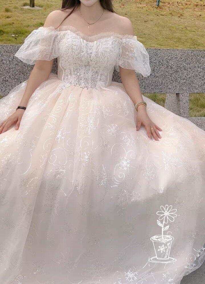 Ethereal shimmering puff sleeve evening gown with sequin embroidery