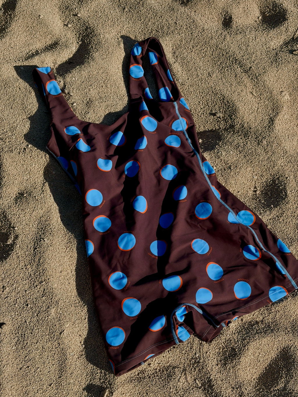 Kadek Surf Onesie Raja