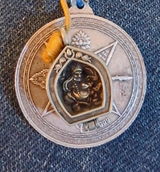 Tiny Dzambhala Ghau Pendant | Metal and Glass | Approx 3/4in x 1/2in | Tibet | Gau