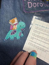 Cat Riding Dragon Embroidered Iron-On Patch